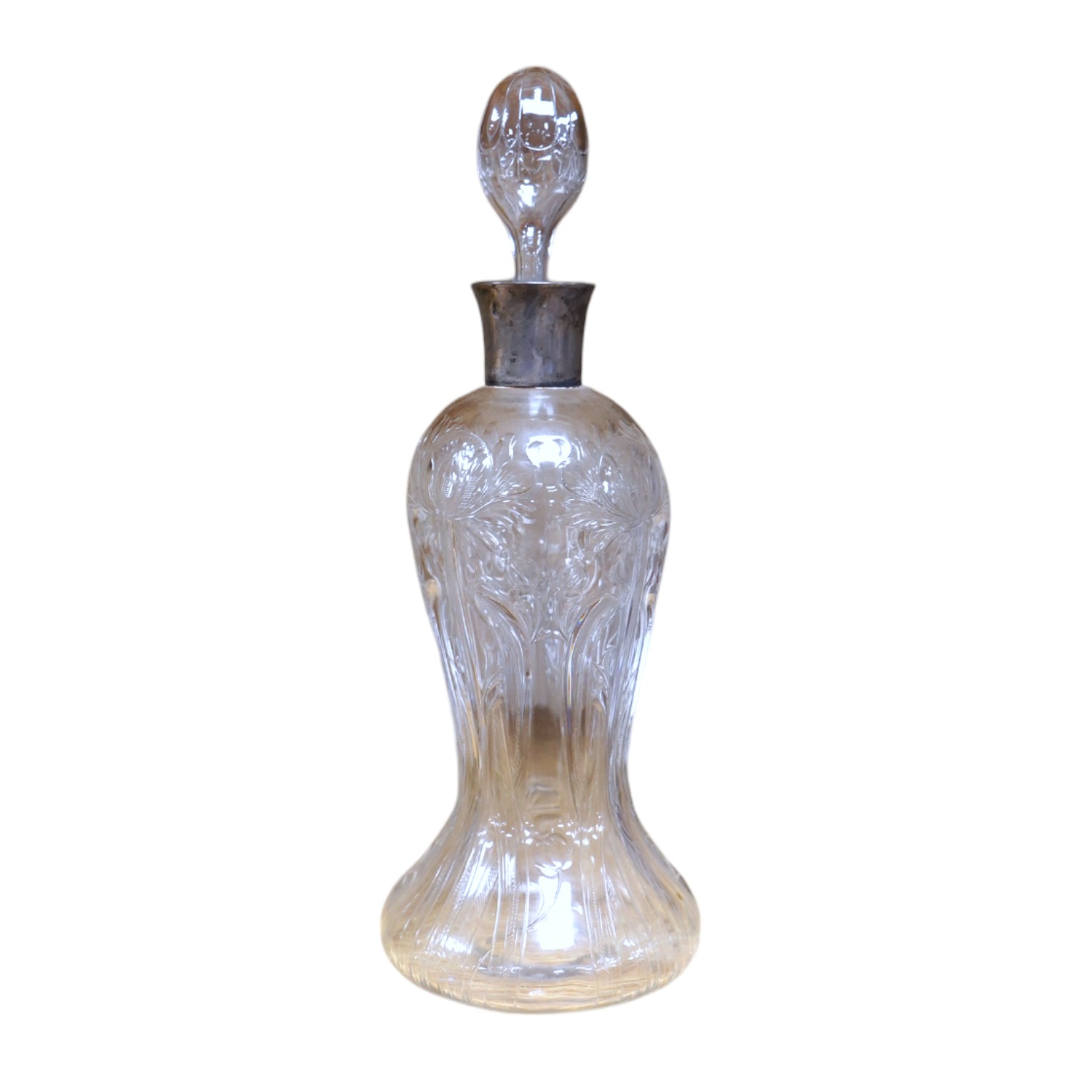 An Edwardian Art Nouveau silver mounted Stourbridge glass decanter, engraved with stylised flowers, John Grinsell & Sons, Birmingham, 1902, 30.5cm high. Condition - good